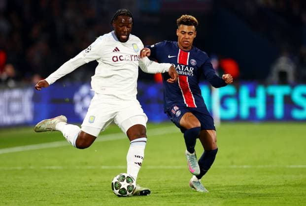 Axel Disasi of Aston Villa and Desire Doue of Paris Saint-Germain. Paris Saint-Germain v Aston Villa, UEFA Champions League, Quarter-Finals, 1st Leg, Football, Parc des Princes, Paris, France - 09 Apr 2025 EDITORIAL USE ONLY No use with unauthorised audio, video, data, fixture lists, club league logos or live services. Online in-match use limited to 120 images, no video emulation. No use in betting, games or single club league player publications. Copyright: xJamesxMarsh Shutterstockx 15243606ck