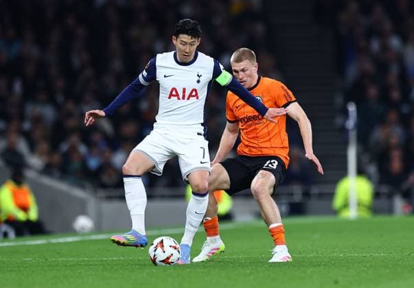 Son Heung-Min of Tottenham Hotspur competes for the ball with Rasmus Kristensen of Eintracht Frankfurt Tottenham Hotspur v Eintracht Frankfurt, UEFA Europa League, Quarter Final, First Leg, Football, Tottenham Hotspur Stadium, London, UK - 10 Apr 2025 EDITORIAL USE ONLY No use with unauthorised audio, video, data, fixture lists, club league logos or live services. Online in-match use limited to 120 images, no video emulation. No use in betting, games or single club league player publications. Copyright: xMichaelxZemanek Shutterstockx 15243632ab