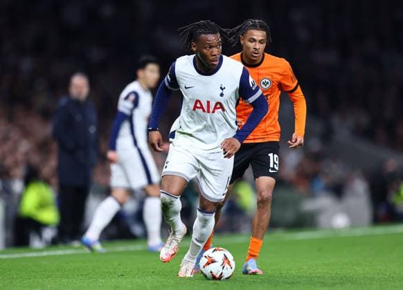 Destiny Udogie of Tottenham Hotspur and Jean-Matteo Bahoya of Eintracht Frankfurt Tottenham Hotspur v Eintracht Frankfurt, UEFA Europa League, Quarter Final, First Leg, Football, Tottenham Hotspur Stadium, London, UK - 10 Apr 2025 EDITORIAL USE ONLY No use with unauthorised audio, video, data, fixture lists, club league logos or live services. Online in-match use limited to 120 images, no video emulation. No use in betting, games or single club league player publications. Copyright: xMichaelxZemanek Shutterstockx 15243632ag