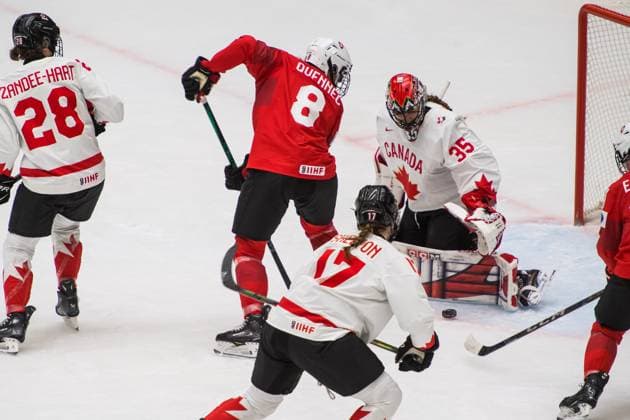 (L-R) Micah Zandee-Hart of Canada, Kaleigh Quennec of Switzerland, Ella Shelton of Canada and goalkeeper Ann-Renee Desbiens of Canada in action during the Ice hockey, Eishockey IIHF Women s World Championship, WM, Weltmeisterschaft Group A, match Switzerland vs Canada, Ceske Budejovice, Czech Republic, April 11, 2025. (CTKxPhoto PetrxSkrivanek) CTKPhotoP2025041106005 CTKPhotoP2025041106005