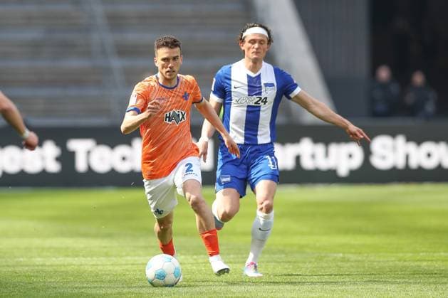 12.04.2025, xtgx, Fussball - 2.Bundesliga, Hertha BSC Berlin - SV Darmstadt 98 emspor, v.l. Sergio Lopez (Darmstadt, 2), Fabian Reese (Hertha, 11) Zweikampf, Duell, Kampf, tackle (DFL DFB REGULATIONS PROHIBIT ANY USE OF PHOTOGRAPHS as IMAGE SEQUENCES and or QUASI-VIDEO) Berlin