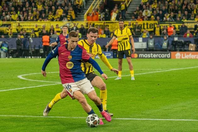 Zweikampf Fermin FC Barcelona, Barca 16) gegen Pascal Gross (Borussia Dortmund 09, 13) im Dortmunder Strafraum, GER BVB Borussia Dortmund 09 vs. FC Barcelona, Fussball, Champions League, Viertelfinale, Saison 2024 2025, 15.04.2025 GER BVB Borussia Dortmund 09 vs. FC Barcelona, Fussball, Champions League, Viertelfinale, Saison 2024 2025, 15.04.2025 Dortmund Copyright: xEibner-Pressefoto FabianxFriesex EP_FFE