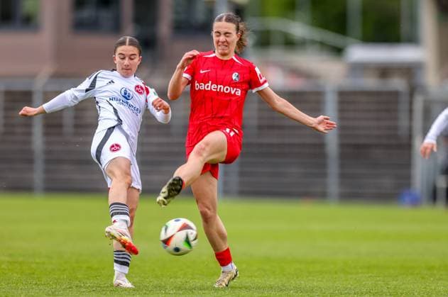 GER, Freiburg, SC Freiburg II vs FC Nürnberg, 2. Frauen Bundesliga, Fussball, DFB, Spielzeit 2024 2025, Möslestadion, 22. Spieltag, im Bild v.l.: Marina Scholz (FC Nürnberg 7), Nora Scherer (SC Freiburg II 11) DFB DFL REGULATIONS PROHIBIT ANY USE OF PHOTOGRAPHS AS IMAGE SEQUENCES AND OR QUASI-VIDEO, 20.04.2025, Copyright: HMBxMedia HendrikxHamelau