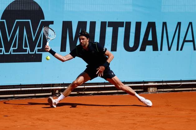 April 23, 2025, Madrid, Madrid, SPAIN: Arthur Rinderknech of France in action against Roman Safiullin of Russia during the Mutua Madrid Open 2025, ATP, Tennis Herren Masters 1000 and WTA, Tennis Damen 1000, tennis tournament celebrated at Caja Magica on April 23, 2025 in Madrid, Spain. Madrid SPAIN - ZUMAa181 20250423_zaa_a181_090 Copyright: xDennisxAgyemanx