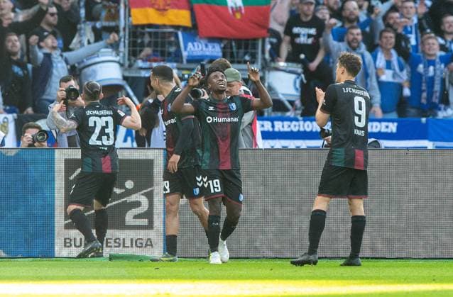Fussball, Herren, Saison 2024 2025, 2. Bundesliga (31. Spieltag), Hertha BSC - 1. FC Magdeburg, v.l. Baris Atik (1. FC Magdeburg), Livan Burcu (1. FC Magdeburg), Lubambo Musonda (1. FC Magdeburg), Martijn Kaars (1. FC Magdeburg), Jubel nach Tor zum 0:1, 25.04. 2025,