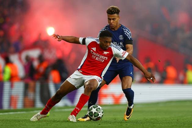 Myles Lewis-Skelly of Arsenal battles with Dà sirà Douà of PSG Arsenal v Paris Saint-Germain, UEFA Champions League, Semi Final, First Leg, Football, Emirates Stadium, London, UK - 29 Apr 2025 EDITORIAL USE ONLY No use with unauthorised audio, video, data, fixture lists, club league logos or live services. Online in-match use limited to 120 images, no video emulation. No use in betting, games or single club league player publications. Copyright: xKieranxMcManus Shutterstockx 15275544ar