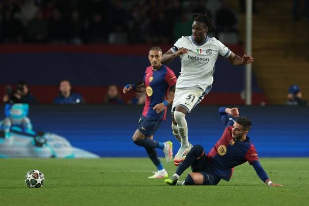 Barcelona, Spain, 30th April 2025. Ferran Torres of FC Barcelona, Barca challenges Yann Bisseck of FC Internazionale during the FC Barcelona vs Internazionale UEFA Champions League match at Estadi Olimpic Luis Companys, Barcelona. Picture credit should read: Jonathan Moscrop Sportimage EDITORIAL USE ONLY. No use with unauthorised audio, video, data, fixture lists, club league logos or live services. Online in-match use limited to 120 images, no video emulation. No use in betting, games or single club league player publications. SPI_043_JM_BARCA_INTER_ SPI-3882-0043