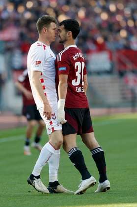 Disput, Wortgefecht zwischen Dominique Heintz (1. FC Koeln, 3) l. und Mahir Emreli (1.FC Nuernberg, 30), 09.05.2025, Fussball, 2. Bundesliga, 1. FC Nürnberg - 1. FC Köln, GER, Nuernberg, Max-Morlock-Stadion, DFL REGULATIONS PROHIBIT ANY USE OF PHOTOGRAPHS AS IMAGE SEQUENCES AND OR QUASI-VIDEO.