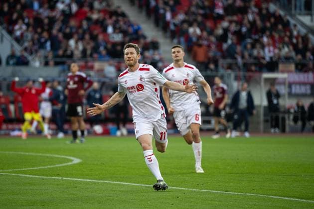 Florian Kainz (FC Koeln, 11), Eric Martel (FC Koeln, 06) jubeln ueber das Tor zum 1:1, GER, 1. FC Nuernberg (FCN) vs 1. FC Koeln (KOE), Fussball 2. Bundesliga, 33. Spieltag, Saison 2024 2025, 09.05.2025 DFB DFL regulations prohibit any use of photographs as image sequences and or quasi-video GER, 1. FC Nuernberg (FCN) vs 1. FC Koeln (KOE), Fussball 2. Bundesliga, 33. Spieltag, Saison 2024 2025, 09.05.2025 Nuernberg
