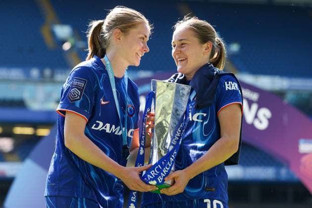 Sjoeke Nusken and Wieke Kaptein of Chelsea pictured together holding the Barclays Women s Super League trophy Chelsea v Liverpool, Football, Barclays Women s Super League, Stamford Bridge, London, UK - 10 05 25 EDITORIAL USE ONLY No use with unauthorised audio, video, data, fixture lists (outside the EU), club league logos or live services. Online in-match use limited to 45 images (+15 in extra time). No use to emulate moving images. No use in betting, games or Copyright: xAnthonyxHanc Shutterstockx 15292910ae