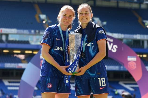 Sjoeke Nusken and Wieke Kaptein of Chelsea pictured together holding the Barclays Women s Super League trophy Chelsea v Liverpool, Football, Barclays Women s Super League, Stamford Bridge, London, UK - 10 05 25 EDITORIAL USE ONLY No use with unauthorised audio, video, data, fixture lists (outside the EU), club league logos or live services. Online in-match use limited to 45 images (+15 in extra time). No use to emulate moving images. No use in betting, games or Copyright: xAnthonyxHanc Shutterstockx 15292910ga