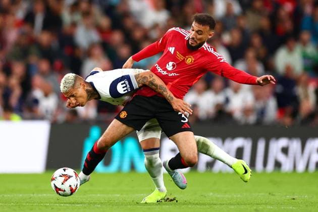 Richarlison of Tottenham Hotspur and Noussair Mazraoui of Manchester United, ManU Tottenham Hotspur v Manchester United, Europa League Final, Football, San Mames Stadium, Bilbao, Spain - 21 May 2025 EDITORIAL USE ONLY No use with unauthorised audio, video, data, fixture lists, club league logos or live services. Online in-match use limited to 120 images, no video emulation. No use in betting, games or single club league player publications. Copyright: xJamesxMarsh Shutterstockx 15312890cv