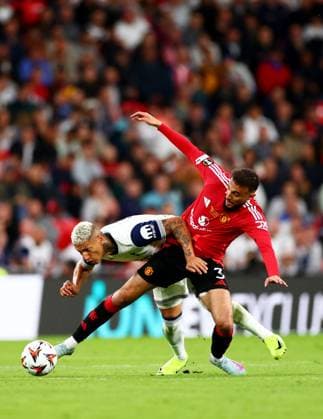 Richarlison of Tottenham Hotspur and Noussair Mazraoui of Manchester United, ManU Tottenham Hotspur v Manchester United, Europa League Final, Football, San Mames Stadium, Bilbao, Spain - 21 May 2025 EDITORIAL USE ONLY No use with unauthorised audio, video, data, fixture lists, club league logos or live services. Online in-match use limited to 120 images, no video emulation. No use in betting, games or single club league player publications. Copyright: xJamesxMarsh Shutterstockx 15312890gi