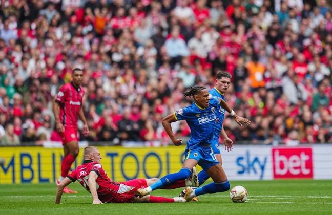 Ryan Stirk of Walsall and Alistair Smith of AFC Wimbledon , Sky Bet branding on the internal LED boards AFC Wimbledon v Walsall, EFL Sky Bet League Two, Play-Off Final, Football, Wembley Stadium, London, UK - 26 May 2025 EDITORIAL USE ONLY No use with unauthorised audio, video, data, fixture lists, club league logos or live services. Online in-match use limited to 120 images, no video emulation. No use in betting, games or single club league player publications. Copyright: xJoexToth Shutterstockx 15316459bc