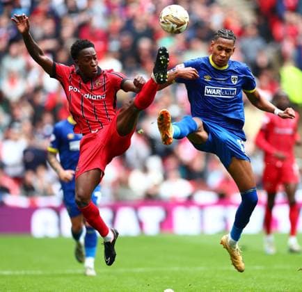 Liam Gordon of Walsall and Alistair Smith of AFC Wimbledon AFC Wimbledon v Walsall, EFL Sky Bet League Two, Play-Off Final, Football, Wembley Stadium, London, UK - 26 May 2025 EDITORIAL USE ONLY No use with unauthorised audio, video, data, fixture lists, club league logos or live services. Online in-match use limited to 120 images, no video emulation. No use in betting, games or single club league player publications. Copyright: xJamesxMarsh Shutterstockx 15316457fp