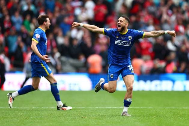 Marcus Browne of AFC Wimbledon celebrates at full time AFC Wimbledon v Walsall, EFL Sky Bet League Two, Play-Off Final, Football, Wembley Stadium, London, UK - 26 May 2025 EDITORIAL USE ONLY No use with unauthorised audio, video, data, fixture lists, club league logos or live services. Online in-match use limited to 120 images, no video emulation. No use in betting, games or single club league player publications. Copyright: xJamesxMarsh Shutterstockx 15316457fy