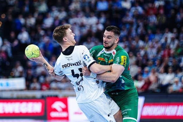Emil Wernsdorf Madsen (THW Kiel, 45), Luka Rogan (SC DHfK Leipzig, 33) GER, THW Kiel vs. SC DHfK Leipzig, Handball, Bundesliga, Spieltag, 31, Saison 2024 2025, 28.05.2025 GER, THW Kiel vs. SC DHfK Leipzig, Handball, Bundesliga, Spieltag, 31, Saison 2024 2025, 28.05.2025 Kiel Copyright: xEibner-Pressefoto MarcelxvonxFehrnx EP_MFN