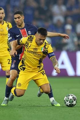 Lautaro Martinez of Inter Milan and Achraf Hakimi of PSG Paris Saint-Germain v Inter Milan, UEFA Champions League Final, Football, Allianz Arena, Munich, Germany - 31 May 2025 EDITORIAL USE ONLY No use with unauthorised audio, video, data, fixture lists, club league logos or live services. Online in-match use limited to 120 images, no video emulation. No use in betting, games or single club league player publications. Copyright: xMichaelxZemanek Shutterstockx 15330931as