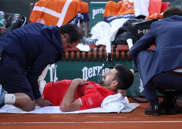 Novak Djokovic receives a medical time out on his leg French Open Tennis, Day Thirteen, Tennis, Roland Garros, Paris, France - 06 Jun 2025 EDITORIAL USE ONLY No use with unauthorised audio, video, data, fixture lists, club league logos or live services. Online in-match use limited to 120 images, no video emulation. No use in betting, games or single club league player publications. Copyright: xEllaxLing Shutterstockx 15338002az