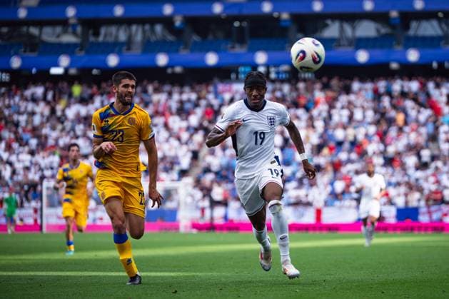 World Cup Qualifiers-Group Stage-Group K-Andorra v England in Cornella, Spain. Cornella, Spain, 7, June, 2025. England national team, Nationalteam player (19) Noni Madueke vies with (23) Biel Borra Font during World Cup qualifying match between Andorra and England in RCDE Stadium, Cornella, Spain, on June 7, 2025. Cornella RCDE Stadium Barcelona Spain