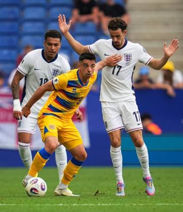 Curtis Jones of England battles with Ricard Fernandez of Andorra Andorra v England, FIFA 2026 World Cup Qualifying, Group K, Football, RCDE Stadium, Barcelona, Spain - 07 Jun 2025 EDITORIAL USE ONLY No use with unauthorised audio, video, data, fixture lists, club league logos or live services. Online in-match use limited to 120 images, no video emulation. No use in betting, games or single club league player publications. Copyright: xBaguxBlanco Shutterstockx 15345797bq