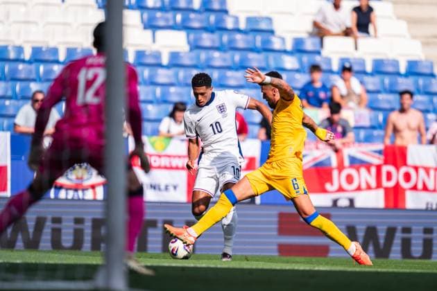 (250608) -- BARCELONA, June 8, 2025 -- Jude Bellingham (C) of England vies with Christian Garcia (R) of Andorra during the FIFA World Cup, WM, Weltmeisterschaft, Fussball European Qualifiers football match between England and Andorra, in RCDE Stadium, Barcelona, Spain, on June 7, 2025. ) (SP)SPAIN-BARCELONA-FOOTBALL-FIFA WORLD CUP QUALIFIER-ENGLAND VS ANDORRA JoanxGosa
