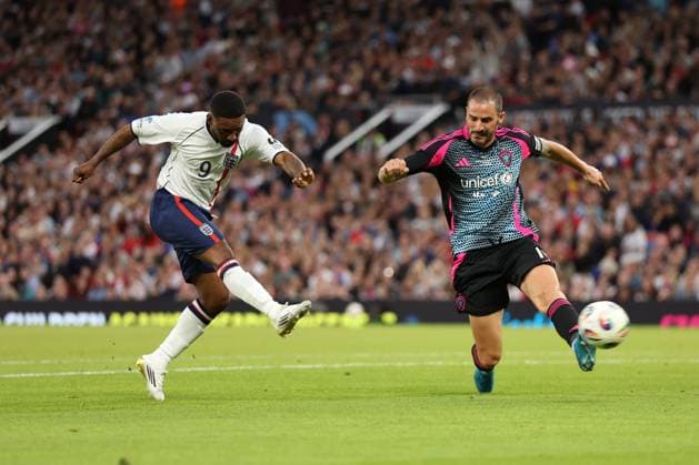 Jermaine Defoe of England shoots England XI v World XI, Soccer Aid for Unicef 2025, Football, Old Trafford, Manchester, UK - 15 Jun 2025 EDITORIAL USE ONLY No use with unauthorised audio, video, data, fixture lists, club league logos or live services. Online in-match use limited to 120 images, no video emulation. No use in betting, games or single club league player publications. Copyright: xRyanxBrowne Shutterstockx 15352333dm