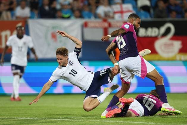 James McAtee of England Under 21 is brought down by Caspar Jander of Germany Under 21 England U21, U 21 v Germany U21, UEFA Under 21 European Championship, EM, Europameisterschaft 2025, Group B, Football, Nitra Stadium, Nitra, Slovakia - 18 Jun 2025 EDITORIAL USE ONLY No use with unauthorised audio, video, data, fixture lists, club league logos or live services. Online in-match use limited to 120 images, no video emulation. No use in betting, games or single club league player publications. Copyright: xNikolaxKrstic Shutterstockx 15363358dl