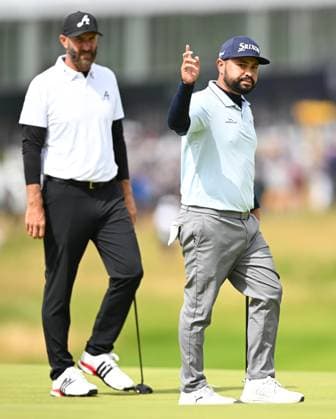 J.J. Spaun celebrates holing a putt on the 1st green for a birdie playing with Dustin Johnson The Open Championship, Day Three, Golf, Royal Portrush Golf Club, Portrush, Northern Ireland, UK - 19 Jul 2025 EDITORIAL USE ONLY No use with unauthorised audio, video, data, fixture lists, club league logos or live services. Online in-match use limited to 120 images, no video emulation. No use in betting, games or single club league player publications. Copyright: xGreigxCowie Shutterstockx 15403239a