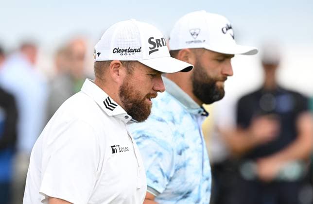 Shane Lowry and Jon Rahm walk off the second tee The Open Championship, Day Three, Golf, Royal Portrush Golf Club, Portrush, Northern Ireland, UK - 19 Jul 2025 EDITORIAL USE ONLY No use with unauthorised audio, video, data, fixture lists, club league logos or live services. Online in-match use limited to 120 images, no video emulation. No use in betting, games or single club league player publications. Copyright: xGreigxCowie Shutterstockx 15403239p