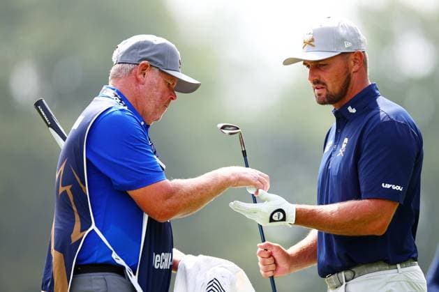 Bryson DeChambeau of USA and caddie Tim Tucker. LIV Golf UK, Pro-AM, Golf, JCB Golf & Country Club, Uttoxeter, UK - 24 Jul 2025Uttoxeter JCB Golf & Country Club United Kingdom EDITORIAL USE ONLY No use with unauthorised audio, video, data, fixture lists, club league logos or live services. Online in-match use limited to 120 images, no video emulation. No use in betting, games or single club league player publications. Copyright: xJamesxMarsh Shutterstockx 15410870am