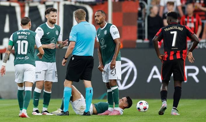 Jack Iredale and Jordan Obita of Hibernian question referee Robert Schröder Midtjylland v Hibernian, UEFA Europa League, 2nd Qualifying Round, First Leg, Football, MCH Arena, Herning, Denmark - 24 Jul 2025Herning MCH Arena Denmark EDITORIAL USE ONLY No use with unauthorised audio, video, data, fixture lists, club league logos or live services. Online in-match use limited to 120 images, no video emulation. No use in betting, games or single club league player publications. Copyright: xJohnnyxPedersen Shutterstockx 15410838am