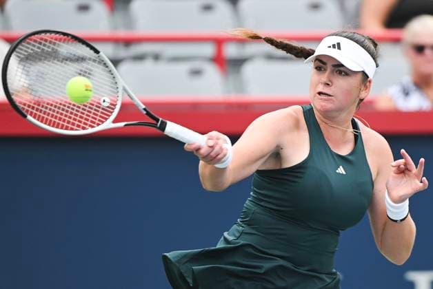 July 27, 2025, Montreal, Pq, Canada: Marina Stakusic, of Canada, plays a shot to Jaqueline Cristian, of Romania, during their first round match at the National Bank Open tennis tournament in Montreal, Sunday, July 27, 2025. Marina Stakusic, Jaqueline Cristian, - ZUMAc35_ 20250727_zaf_c35_002 Copyright: xGrahamxHughesx