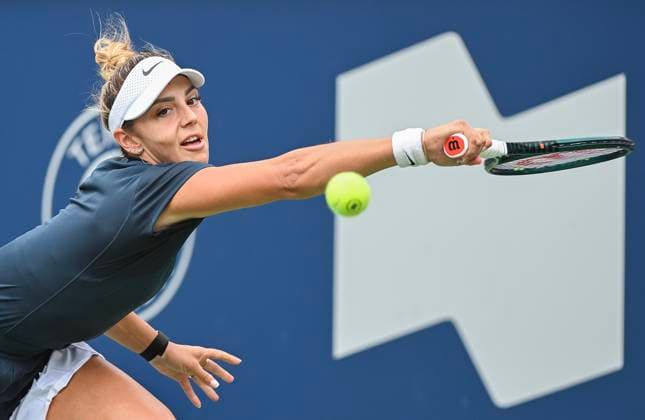 July 27, 2025, Montreal, Pq, Canada: Jaqueline Cristian, of Romania, lunges for the ball during her first round match against Marina Stakusic, of Canada, at the National Bank Open tennis tournament in Montreal, Sunday, July 27, 2025. Marina Stakusic, Jaqueline Cristian, - ZUMAc35_ 20250727_zaf_c35_006 Copyright: xGrahamxHughesx