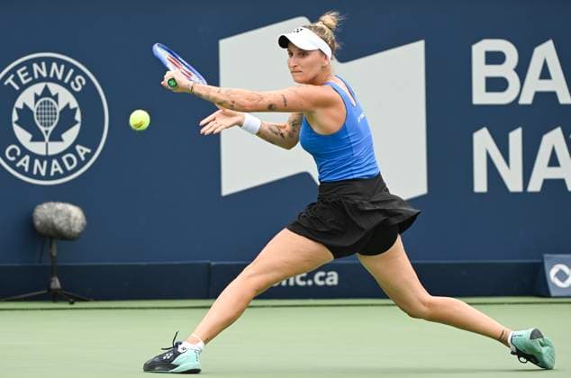 July 27, 2025, Montreal, Pq, Canada: Marketa Vondrousova, of the Czech Republic, lunges for the ball during her first round match against Alexandra Eala, of the Philippines, at the National Bank Open tennis tournament in Montreal, Sunday, July 27, 2025. Marketa Vondrousova, Alexandra Eala, - ZUMAc35_ 20250727_zaf_c35_014 Copyright: xGrahamxHughesx
