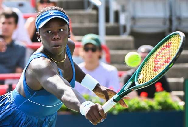 July 27, 2025, Montreal, Pq, Canada: Victoria Mboko, of Canada, plays a shot to Kimberly Birrell, of Australia, during their first round match at the National Bank Open tennis tournament in Montreal, Sunday, July 27, 2025. Victoria Mboko, Kimberly Birrell, - ZUMAc35_ 20250727_zaf_c35_025 Copyright: xGrahamxHughesx