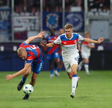 Oliver Antman of Rangers battles for the ball with Karel Spacil of FC Viktoria Plzen during the UEFA Champions League Third Round qualifying second leg at the Doosan Arena, Plzen. Viktoria Plzen v Rangers, UEFA Champions League, 3rd Qualifying Round, Second Leg, Football, Doosan Arena, Plzen, Czech Republic, UK - 12 Aug 2025Plzen Doosan Arena Czech Republic EDITORIAL USE ONLY No use with unauthorised audio, video, data, fixture lists, club league logos or live services. Online in-match use limited to 120 images, no video emulation. No use in betting, games or single club league player publications. Copyright: xRangersxFC Shutterstockx 15438242el