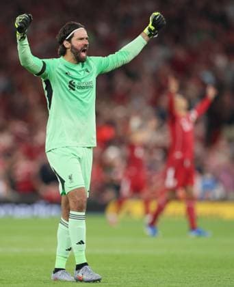 Alisson Becker of Liverpool celebrates the 2nd goal scored by Cody Gakpo of Liverpool Liverpool v AFC Bournemouth, Premier League, Football, Anfield, Liverpool, UK - 15 Aug 2025Liverpool Anfield United Kingdom EDITORIAL USE ONLY No use with unauthorised audio, video, data, fixture lists, club league logos or live services. Online in-match use limited to 120 images, no video emulation. No use in betting, games or single club league player publications. Copyright: xPaulxCurrie Shutterstockx 15438038dz