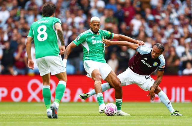 Joelinton of Newcastle United and Boubacar Kamara of Aston Villa. Aston Villa v Newcastle United, Premier League, Football, Villa Park, Birmingham, UK - 16 Aug 2025Birmingham Villa Park United Kingdom EDITORIAL USE ONLY No use with unauthorised audio, video, data, fixture lists, club league logos or live services. Online in-match use limited to 120 images, no video emulation. No use in betting, games or single club league player publications. Copyright: xJamesxMarsh Shutterstockx 15439535bh