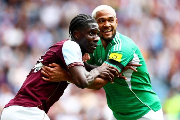 Amadou Onana of Aston Villa and Joelinton of Newcastle United. Aston Villa v Newcastle United, Premier League, Football, Villa Park, Birmingham, UK - 16 Aug 2025Birmingham Villa Park United Kingdom EDITORIAL USE ONLY No use with unauthorised audio, video, data, fixture lists, club league logos or live services. Online in-match use limited to 120 images, no video emulation. No use in betting, games or single club league player publications. Copyright: xJamesxMarsh Shutterstockx 15439535br