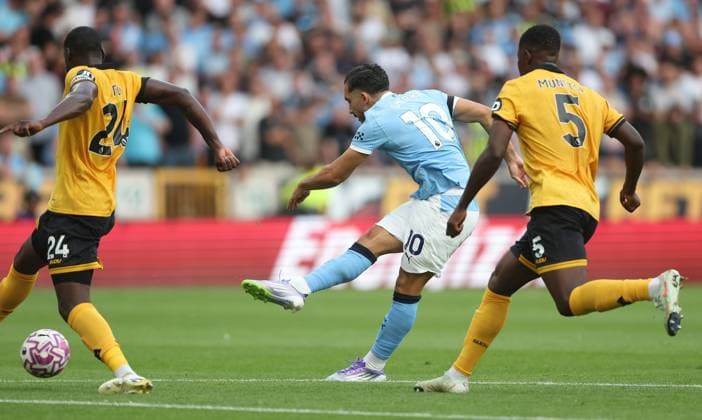 Rayan Cherki of Manchester City scores a goal to make the score 0-4 Wolverhampton Wanderers v Manchester City, Premier League, Football, Molineux, Wolverhampton, UK - 16 Aug 2025Wolverhampton Molineux United Kingdom EDITORIAL USE ONLY No use with unauthorised audio, video, data, fixture lists, club league logos or live services. Online in-match use limited to 120 images, no video emulation. No use in betting, games or single club league player publications. Copyright: xKieranxMcManus Shutterstockx 15444080at