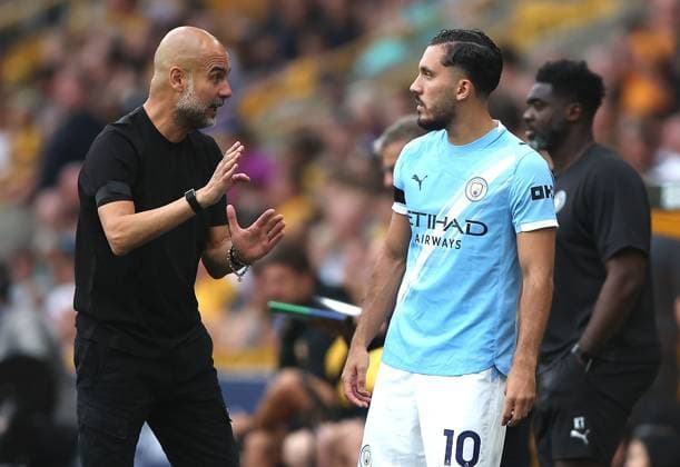 Manchester City manager Pep Guardiola gives instructions to Rayan Cherki of Manchester City before he comes on Wolverhampton Wanderers v Manchester City, Premier League, Football, Molineux, Wolverhampton, UK - 16 Aug 2025Wolverhampton Molineux United Kingdom EDITORIAL USE ONLY No use with unauthorised audio, video, data, fixture lists, club league logos or live services. Online in-match use limited to 120 images, no video emulation. No use in betting, games or single club league player publications. Copyright: xKieranxMcManus Shutterstockx 15444080bb
