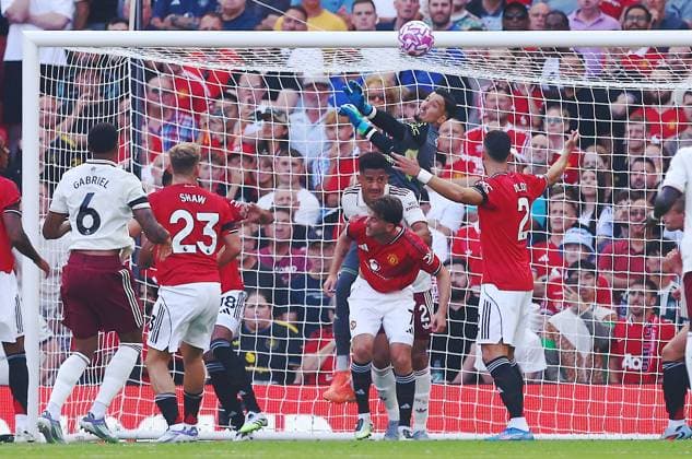 Manchester United, ManU goalkeeper Altay Bayindir fails to deal with a cross before Riccardo Calafiori of Arsenal scores the opening goal Manchester United v Arsenal, Premier League, Football, Old Trafford, Manchester, UK - 17 Aug 2025Manchester Old Trafford United Kingdom EDITORIAL USE ONLY No use with unauthorised audio, video, data, fixture lists, club league logos or live services. Online in-match use limited to 120 images, no video emulation. No use in betting, games or single club league player publications. Copyright: xMattxWest Shutterstockx 15439710an