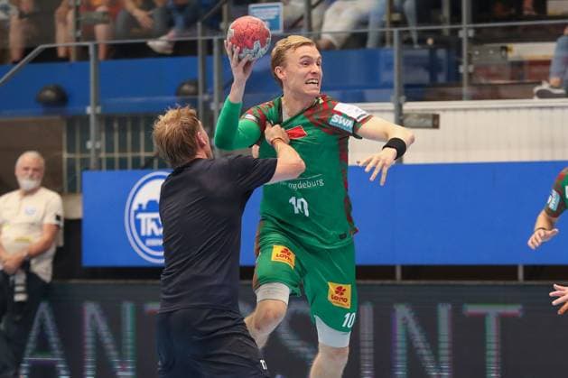 17.08.2025, xgox, Handball - Wartburg Cup SC Magdeburg - Skanderborg Handbold emspor, v.l. Magnus Haubro (Skanderborg, 10) Zweikampf, Duell, Kampf, tackle Eisenach