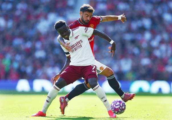 Bruno Fernandes of Manchester United, ManU and Bukayo Saka of Arsenal Manchester United v Arsenal, Premier League, Football, Old Trafford, Manchester, UK - 17 Aug 2025Manchester Old Trafford United Kingdom EDITORIAL USE ONLY No use with unauthorised audio, video, data, fixture lists, club league logos or live services. Online in-match use limited to 120 images, no video emulation. No use in betting, games or single club league player publications. Copyright: xMattxWest Shutterstockx 15439710cm