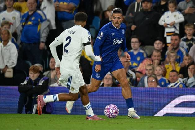 Jayden Bogle of Leeds United and Jack Grealish of Everton Leeds United v Everton, Premier League, Football, Elland Road, Leeds, UK - 18 Aug 2025Leeds Elland Road United Kingdom EDITORIAL USE ONLY No use with unauthorised audio, video, data, fixture lists, club league logos or live services. Online in-match use limited to 120 images, no video emulation. No use in betting, games or single club league player publications. Copyright: xAnnaxGowthorpe Shutterstockx 15446420ck