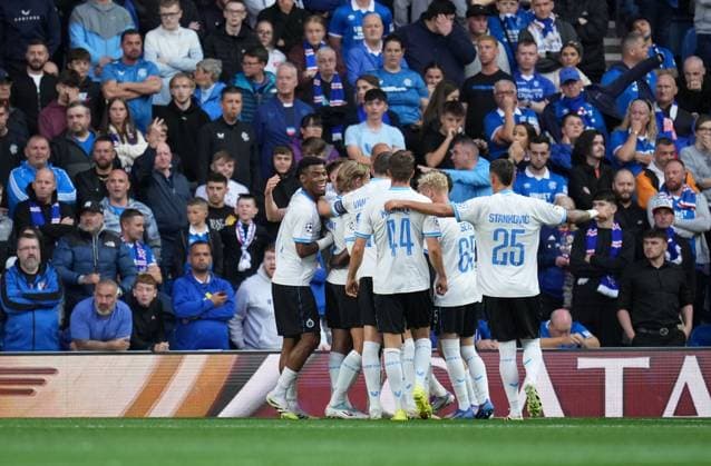 Jorne Spileers of Club Brugge celebrates with team mates after scoring to give Brugge a 0-2 lead. Rangers v Club Brugge, UEFA Champions League, Play-Off Round, First Leg, Football, Ibrox Stadium, Glasgow, Scotland, UK - 19 Aug 2025Glasgow Ibrox Stadium Scotland United Kingdom EDITORIAL USE ONLY No use with unauthorised audio, video, data, fixture lists, club league logos or live services. Online in-match use limited to 120 images, no video emulation. No use in betting, games or single club league player publications. Copyright: xStuartxWallace Shutterstockx 15446679x