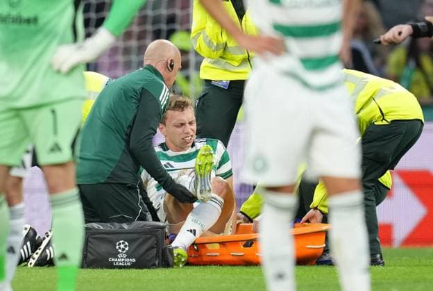 Alistair Johnston of Celtic is helped on to a stretcher before being carried off the pitch injured and substituted for Anthony Ralston of Celtic. Celtic v Kairat Almaty, UEFA Champions League, Play-Off Round, First Leg, Football, Celtic Park, Glasgow, Scotland, UK - 20 Aug 2025Glasgow Celtic Park Scotland United Kingdom EDITORIAL USE ONLY No use with unauthorised audio, video, data, fixture lists, club league logos or live services. Online in-match use limited to 120 images, no video emulation. No use in betting, games or single club league player publications. Copyright: xStuartxWallace Shutterstockx 15446684ac
