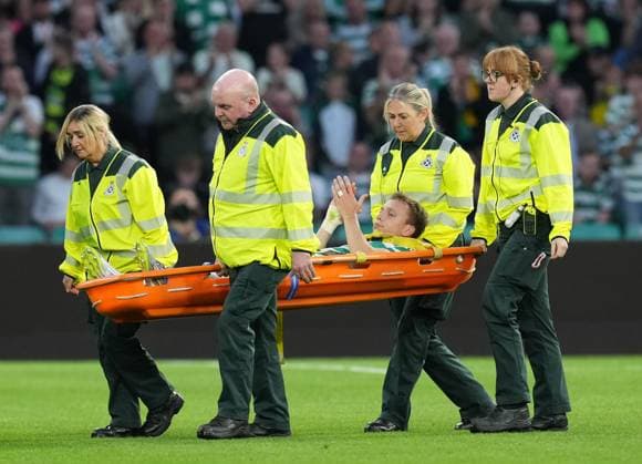 Alistair Johnston of Celtic is carried off the pitch on a stretcher injured and substituted for Anthony Ralston of Celtic. Celtic v Kairat Almaty, UEFA Champions League, Play-Off Round, First Leg, Football, Celtic Park, Glasgow, Scotland, UK - 20 Aug 2025Glasgow Celtic Park Scotland United Kingdom EDITORIAL USE ONLY No use with unauthorised audio, video, data, fixture lists, club league logos or live services. Online in-match use limited to 120 images, no video emulation. No use in betting, games or single club league player publications. Copyright: xStuartxWallace Shutterstockx 15446684aj