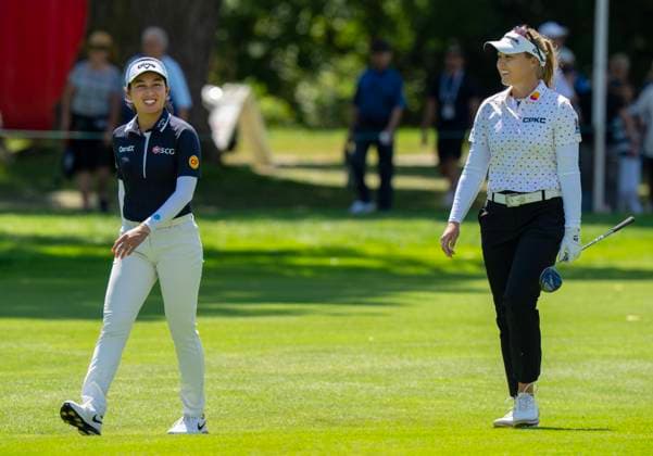 August 21, 2025, Mississauga, On, CANADA: Brooke Henderson of Canada, right, and Jeeno Thitikul of Thailand share a laugh as they walk down the 12th fairway in the first round of the Canadian Women s Open at Mississauga Golf and Country Club in Mississauga, Ont., Thursday, Aug. 21, 2025. Canada News - August 21, 2025 - ZUMAc35_ 20250821_zaf_c35_091 Copyright: xFrankxGunnx